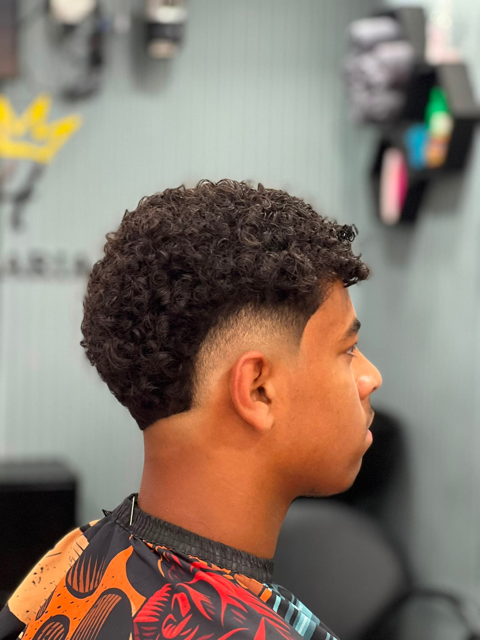 Cliente na cadeira da barbearia