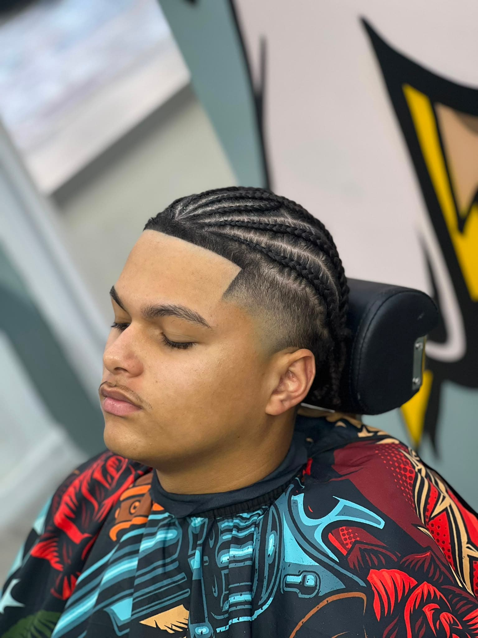 Cliente na cadeira da barbearia